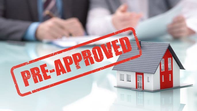 Real estate agent reviewing listings with a first-time buyer
